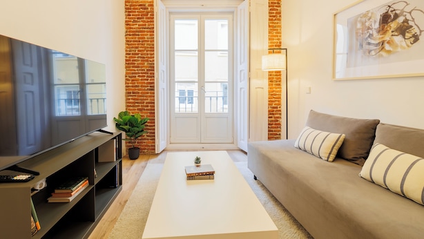 Departamento exclusivo, vista a la ciudad | Área de sala de estar