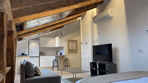 Departamento Confort, vista a la ciudad | Área de sala de estar