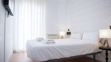 1 dormitori, planxa i posts de planxar, wifi gratuïta i roba de llit