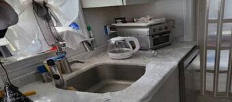 "SPOTLESS " - Walk. No car needed..!  
 Non Smokers ONLY! 
NYC MINUTES AWAY!