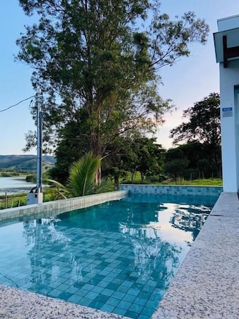 Outdoor pool, pool umbrellas, sun loungers