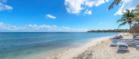 On the beach, beach towels