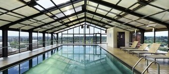 Chic Highrise 2BR King Bed Deluxe Escape Pool l GYM l Balcony Near DC/Metro/Mall