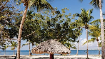 Private beach, white sand, free beach cabanas, sun loungers