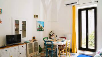 Traditional House | Living area | 32-inch flat-screen TV with cable channels