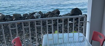 Seafront Sanctuary: Oceanfront Living 30 Feet from the Water at Going Coastal