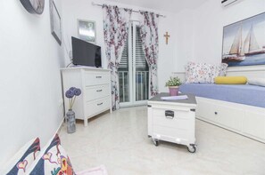 1 dormitorio, tabla de planchar con plancha, wifi gratis y ropa de cama