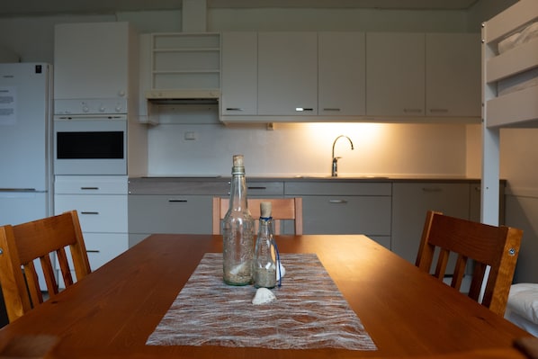 Apartment | Private kitchen | Full-size fridge, oven, stovetop, dishwasher