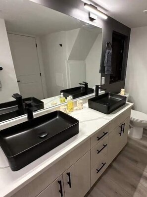 Shower, towels, soap, shampoo