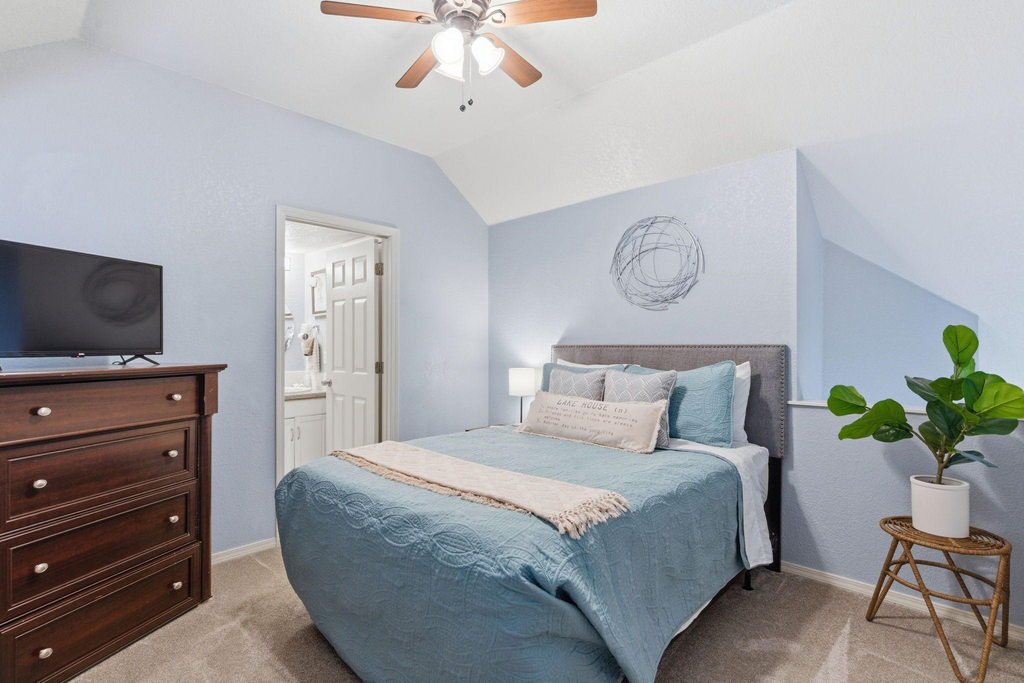 Spacious master bedroom designed for a restful night.