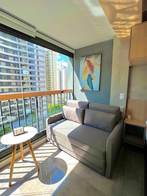 Family Studio | Living area | 32-inch TV with digital channels
