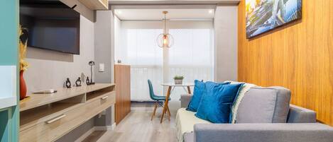 Family Double Room | Living area | 32-inch TV with digital channels