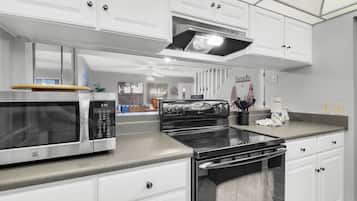 Condo, Multiple Beds (Sugar Beach F-26) | Private kitchen | Oven, toaster, paper towels