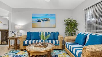 Condo, Multiple Beds (Sugar Beach F-26) | Living area | Flat-screen TV