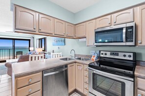 Condo, varias camas (Sundunes 134) | Cocina privada | Horno, tostadora y toallas de papel 