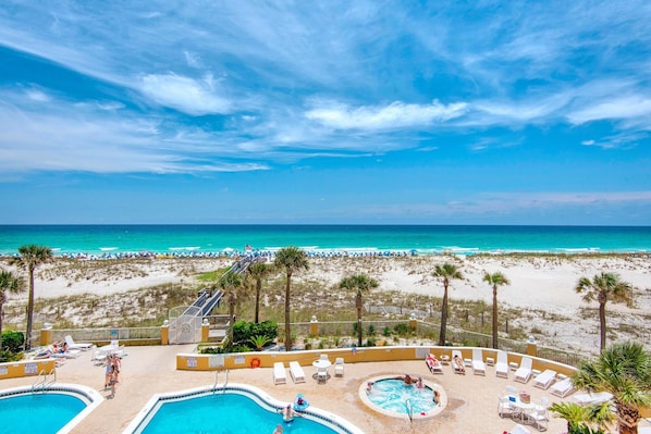 Relax by the pool and enjoy stunning ocean views.