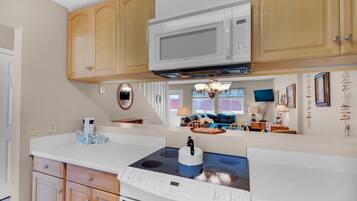 Condo, Multiple Beds (Sugar Beach F-27) | Private kitchen | Oven, toaster, paper towels