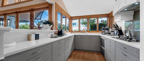 Stovetop, dishwasher, cookware/dishes/utensils, dining tables