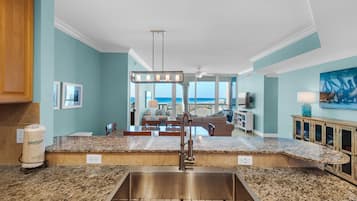 Condo, Multiple Beds (Portofino Island Resort 5-603) | Private kitchen | Oven, toaster, paper towels