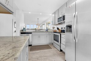 Condo, Multiple Beds (Santa Rosa Dunes 1021) | Private kitchen | Oven, toaster, paper towels - Santa Rosa Dunes 1021 (Pensacola Beach)