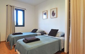 2 quartos, berço de viagem, Wi-Fi de cortesia, roupa de cama