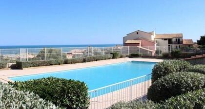 Appartement 'La Perle Marine' avec vue sur la mer, piscine partagée et Wi-Fi