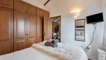 2 slaapkamers, een strijkplank/strijkijzer, gratis wifi, beddengoed