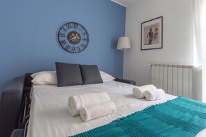 1 habitación, tabla de planchar con plancha, wifi gratis y ropa de cama 