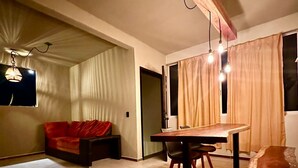 Grand Apartment | Living area | Flat-screen TV - Hotelito´s (Santa María Huatulco)