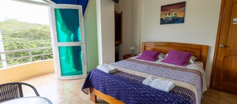 Queen Bedroom Suite ON THE Second High Floor AT Ariana`s Galapagos Hostal