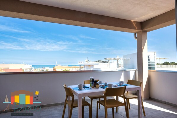 Outdoor dining - Fantastic new penthouse with seaview P19 (Rosolina Mare)