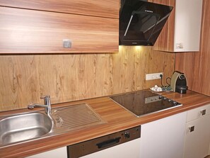 Fridge, microwave, cookware/dishes/utensils