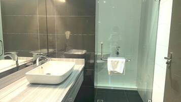 Shower, bidet, towels, soap