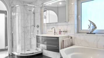 Shower, hair dryer, towels
