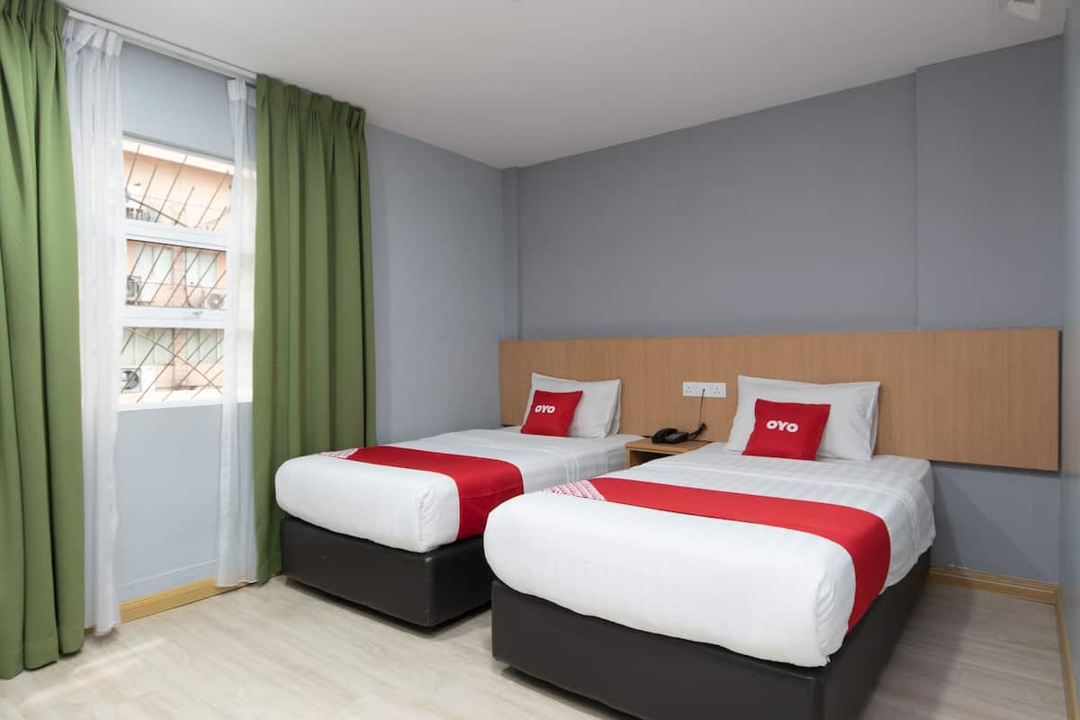 Habitación Deluxe con 2 camas individuales | 1 dormitorio, wifi gratis, ropa de cama