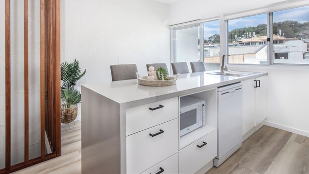 Fridge, microwave, oven, stovetop - 3 Bedroom Beachside Haven in Burleigh Heads (Gold Coast)