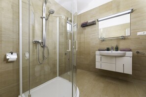 Bidet, towels, soap, toilet paper