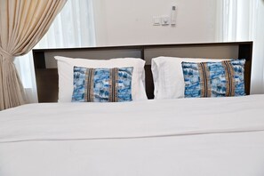 1 chambre, fer et planche à repasser, Wi-Fi gratuit, draps fournis
