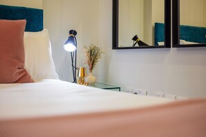 Iron/ironing board, travel crib, free WiFi, bed sheets