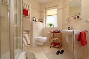 Shower, hair dryer, towels