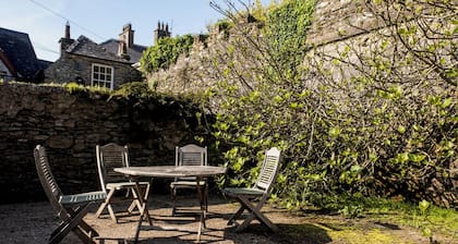 Coach house sleeping 8 in historic yard near gorgeous beaches .