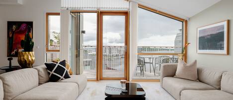 Departamento exclusivo, 2 habitaciones, vista al océano | Área de sala de estar