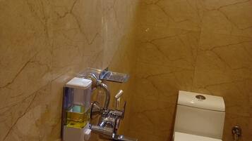 Standard Double Room | Bathroom | Shower, rainfall showerhead, towels, soap