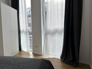 2 dormitorios, tabla de planchar con plancha, wifi y ropa de cama