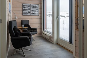 Comfort Apartment, Ocean View | Living area - Ekker Island Arctic Lodge (Vadsø)