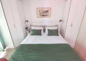 1 bedroom, desk, iron/ironing board, travel cot