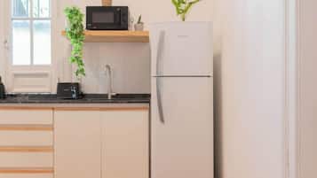 Coffee/tea maker, microwave, toaster, cookware/dishes/utensils