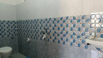 Shower, rainfall showerhead, bathrobes, towels