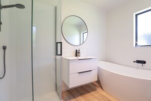 Shower, hair dryer, towels