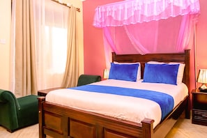 In-room safe, desk, laptop workspace, soundproofing - Beri Cottages (Arua)